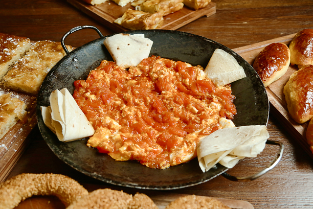 Deliciously Plated Food on a Rustic Wooden Table
